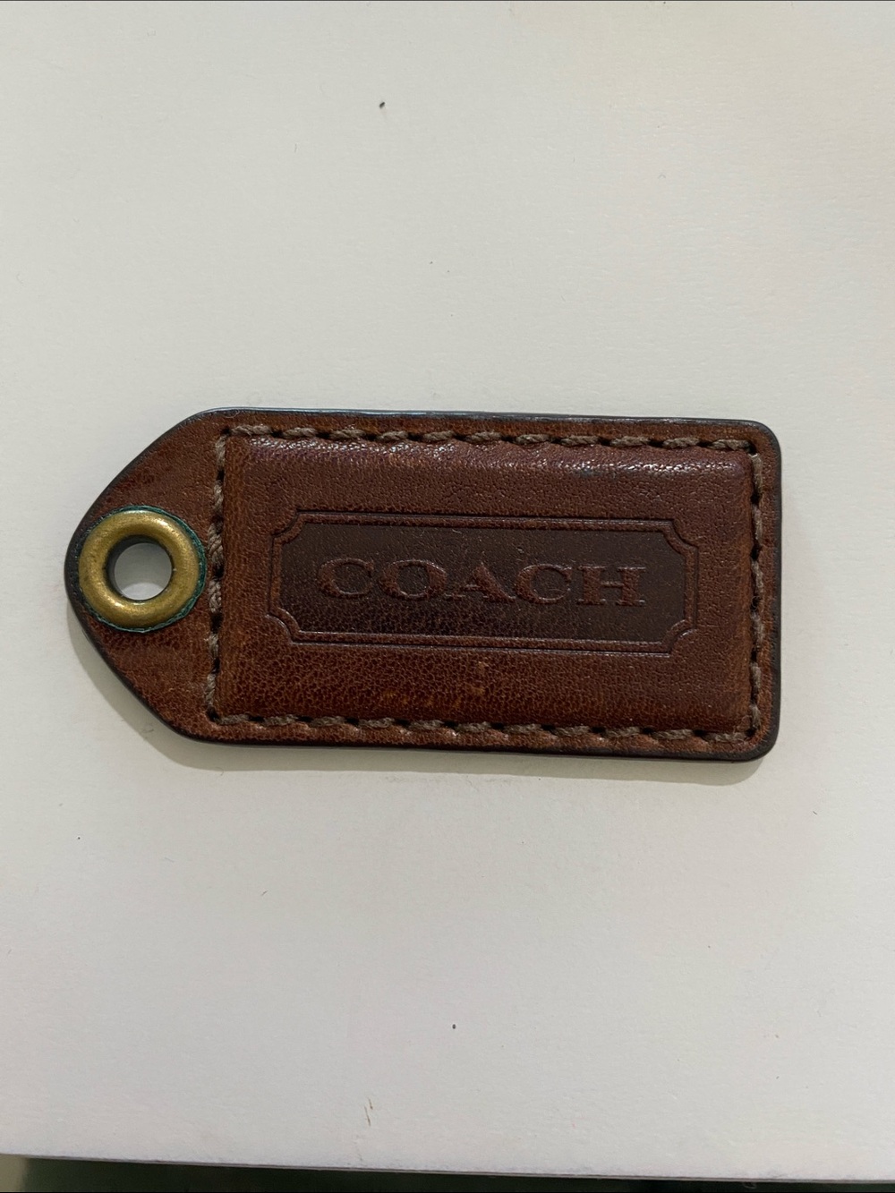 COACH Brown Leather Hang Tag with Brass Grommet